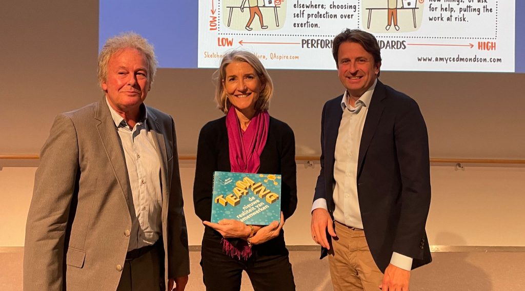 Amy Edmondson receiving the first copy of the new book Teaming by Patrick Davidson and Hans van der Loo at Radboud UMC (September 21st, 2022)